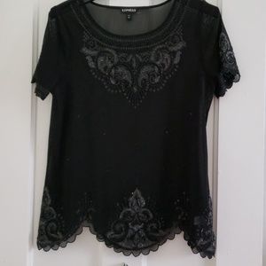 Embellished sheer black top